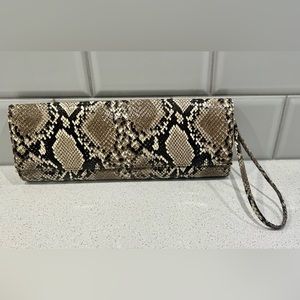 Stuart Weitzman snakeskin clutch